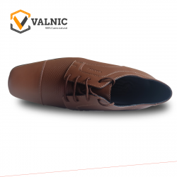 Zapato de cuero color marron